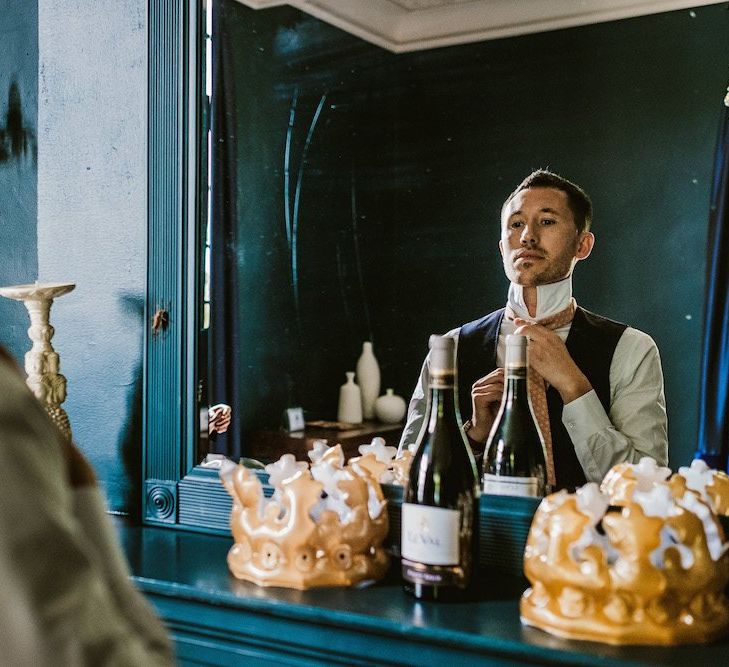 Groom preparations for Chateau Rigaud wedding