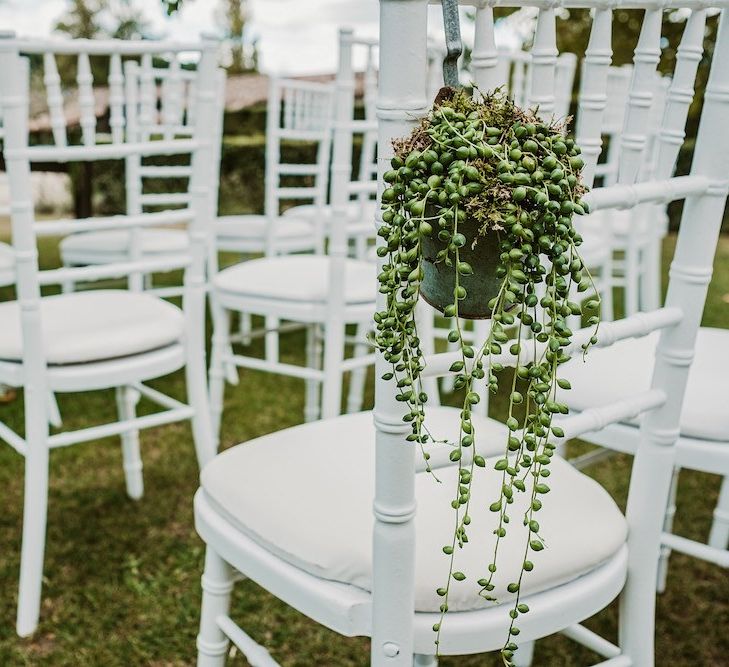 Botanical wedding decor for outdoor ceremony