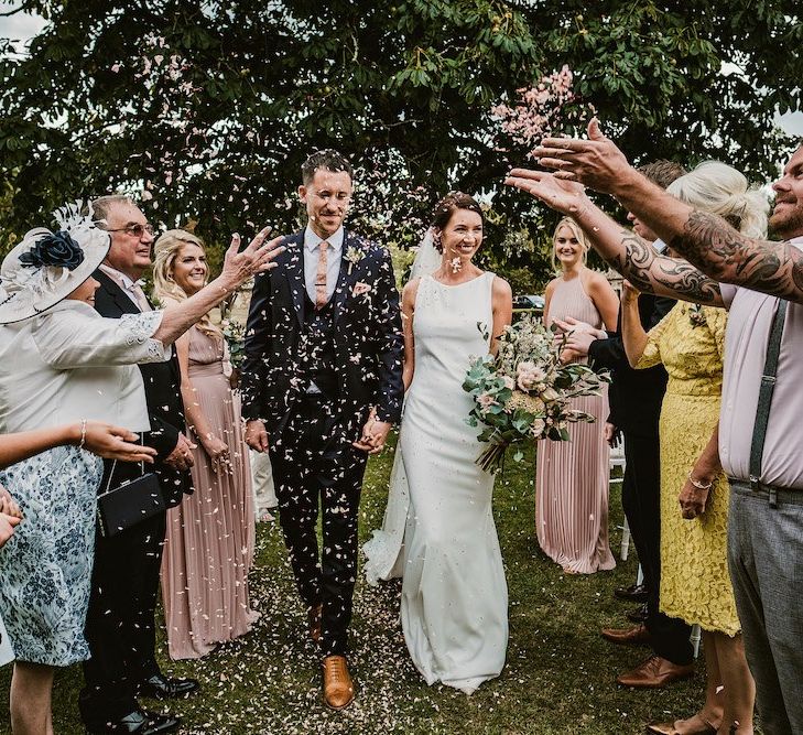 Confetti exit for bride and groom