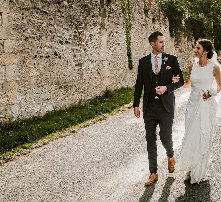 Bride in Pronovias wedding dress with groom