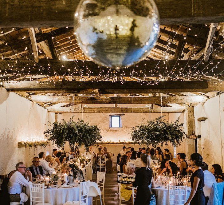 Glitterball wedding decor with fairy lights