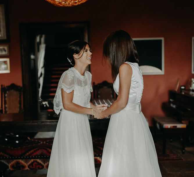 Same sex wedding with two bride in Chiffon, Tulle, lace and satin wedding dresses