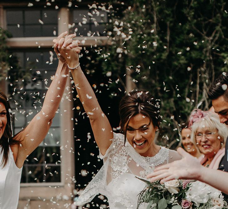 Confetti moment with same-sex couple