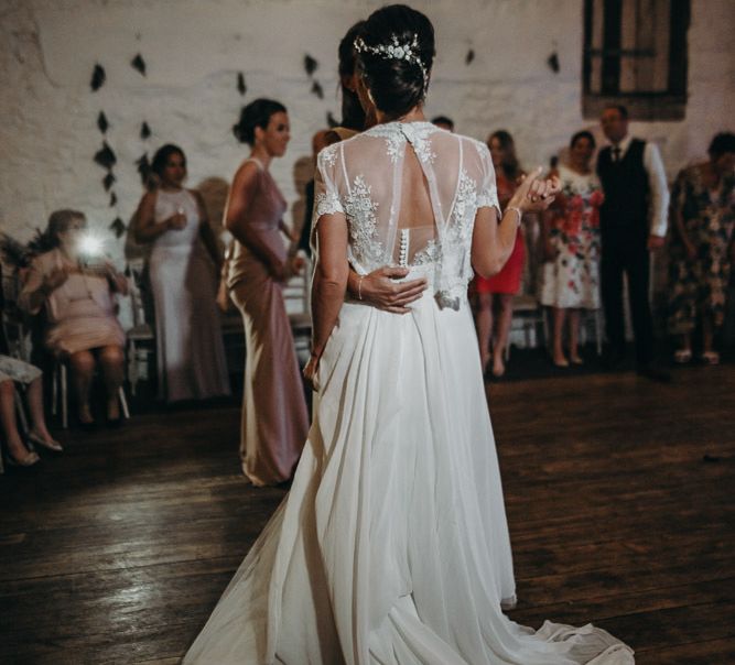 Lesbian wedding first dance with bride in lace coverup