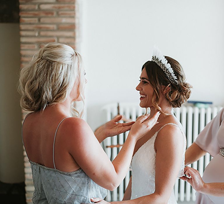 Bridal Preparations With Feather Headdress