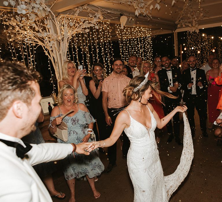 Bride In Feather Headdress For First Dance