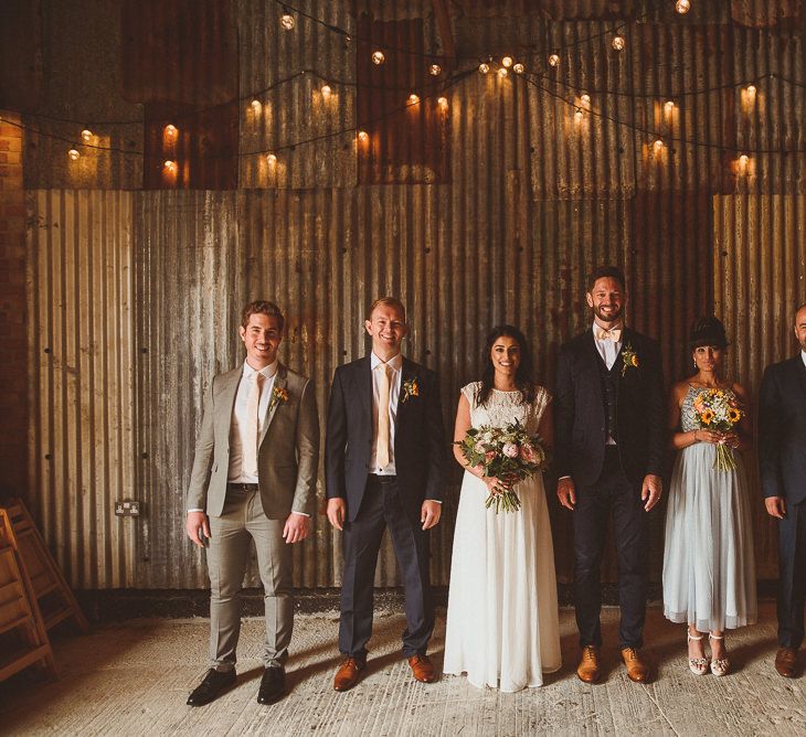 Wedding Party | Bride in Gatsby Lady Gown | Bridesmaids in ASOS Dress | Groomsmen in Navy Reiss Suits | Fusion Rustic Indian Country Wedding at The Green Cornwall | Matt Penberthy Photography