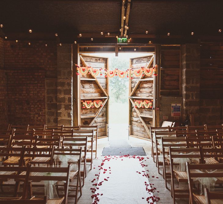 Rustic Barn Indian Ceremony with Festoons, Petals &amp; Colourful Flowers | Fusion Rustic Indian Country Wedding at The Green Cornwall | Matt Penberthy Photography