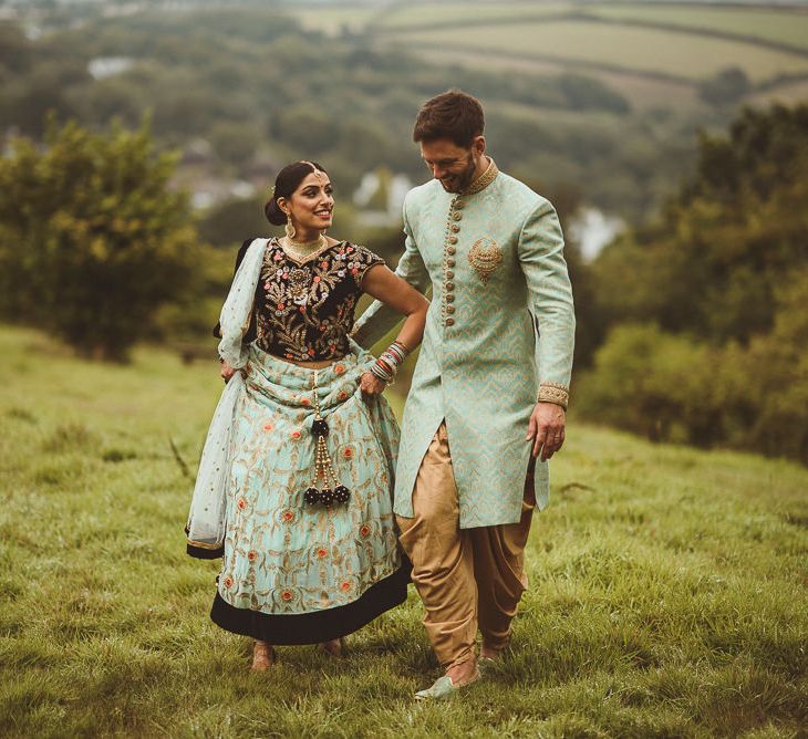 Bride &amp; Groom in Traditional Indian Wedding Attire | Fusion Rustic Indian Country Wedding at The Green Cornwall | Matt Penberthy Photography