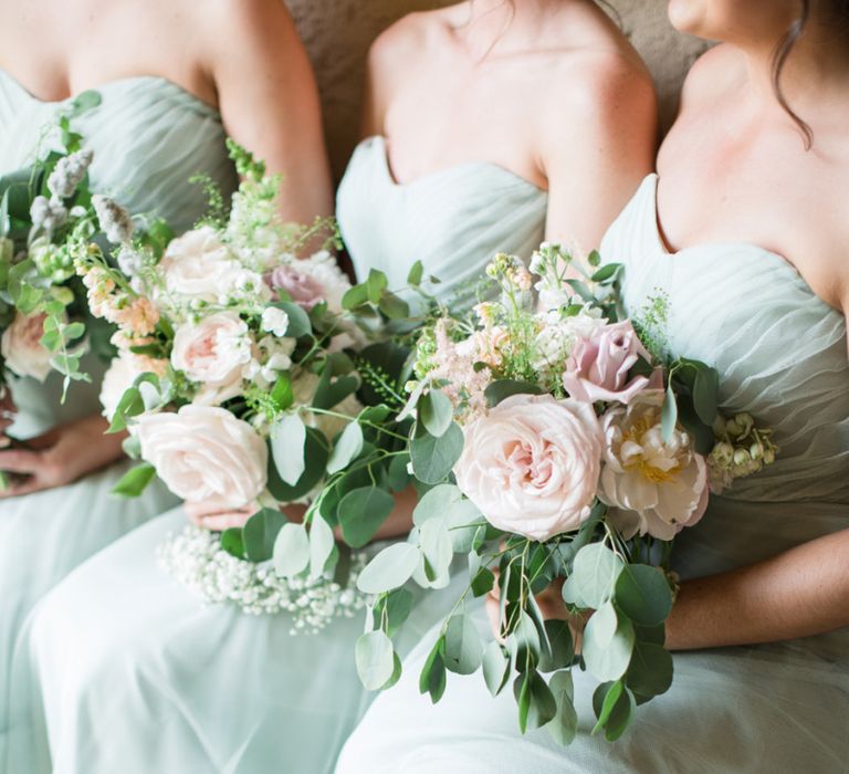 Bridesmaid in Pale Green Dresses with Pink and White  Bouquets