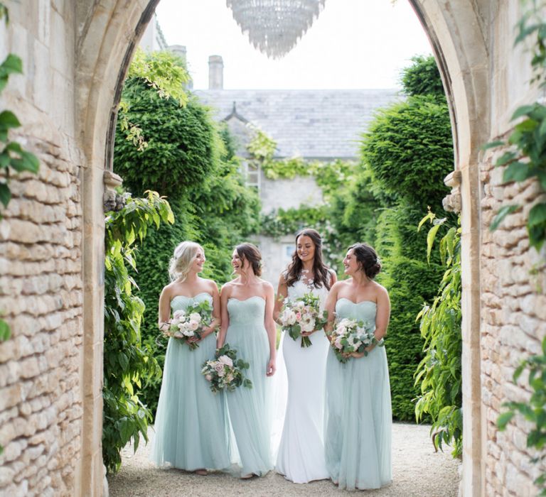 Bridesmaids in Pale Green Dresses at The Lost Orangery