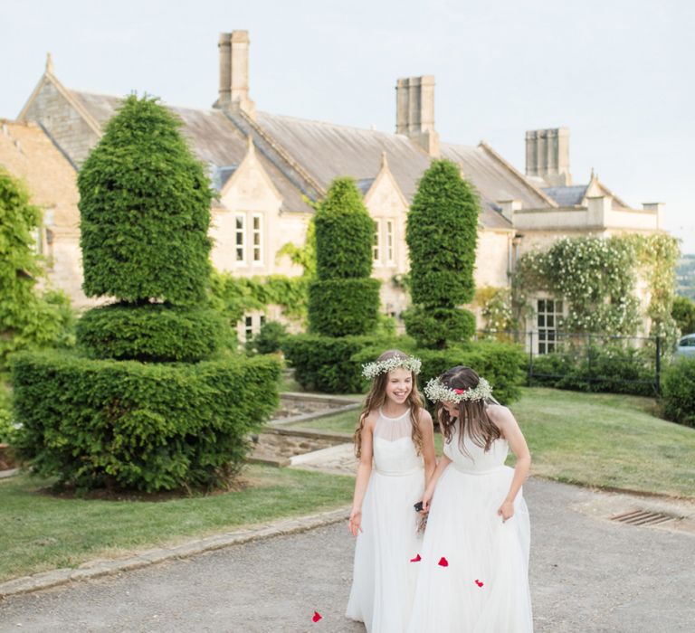 Young Bridesmaids in White Tulle Dresses and Gypsophila Flower Crowns