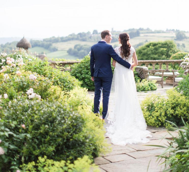 Bride and Groom Portrait Looking Out into the Countryside