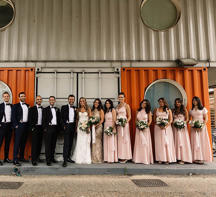 Groom &amp; Groomsmen In Black Tie // London Wedding Venue For 300 People Trinity Buoy Wharf With Bride In Suzanne Neville And Images From Paul Joseph Photography Film This Modern Revelry