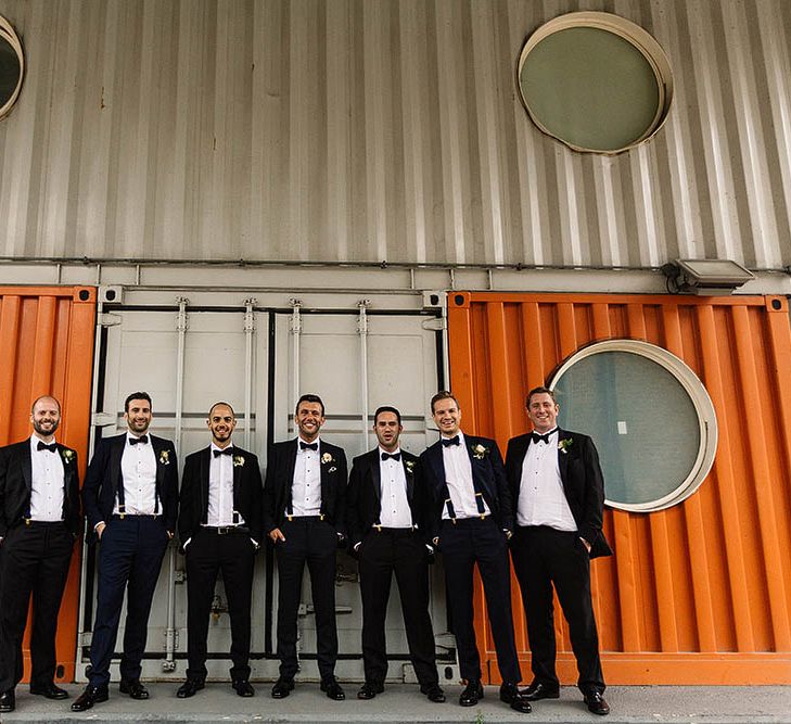 Groom &amp; Groomsmen In Black Tie // London Wedding Venue For 300 People Trinity Buoy Wharf With Bride In Suzanne Neville And Images From Paul Joseph Photography Film This Modern Revelry