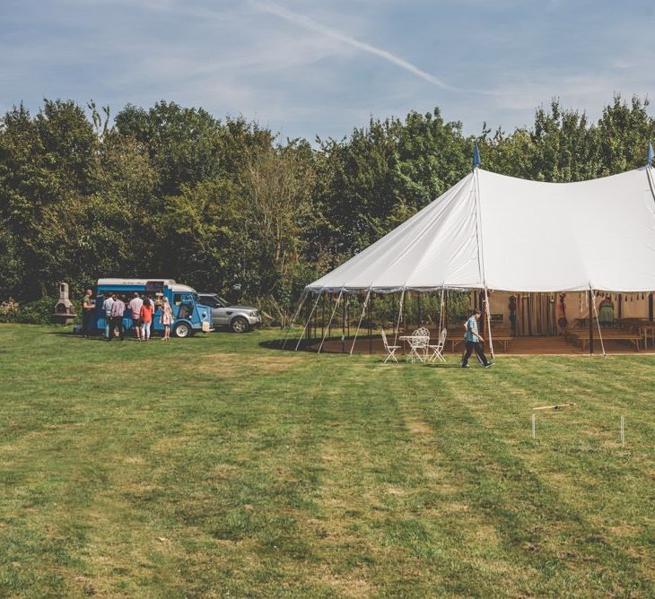 Marquee in the grounds for this fun and bright ceremony