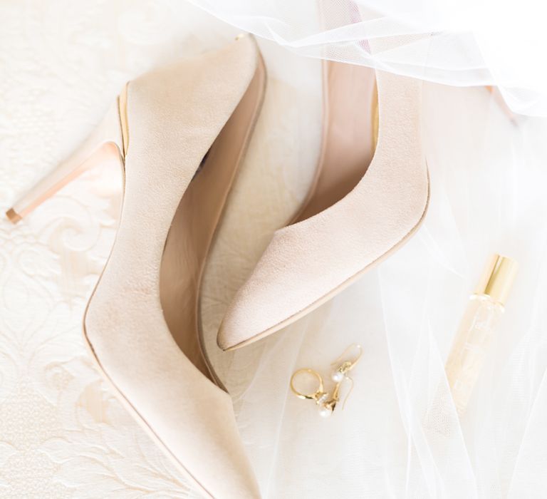 Wedding Shoes | Cowdray House, West Sussex | Photography by Emma Pilkington | Beattie Bailey planning &amp; Styling | Bride wears Suzanne Neville