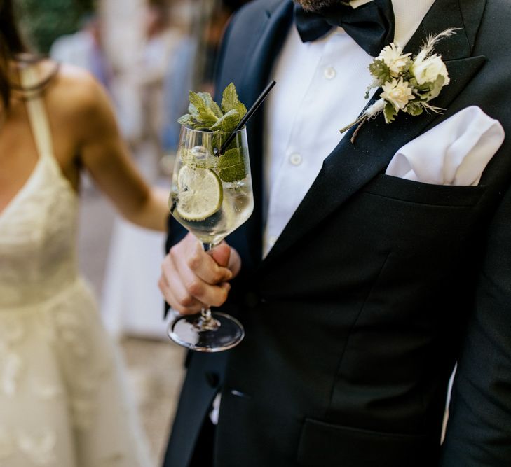 Bride and Groom Enjoying a Gin and Tonic Drinks Reception