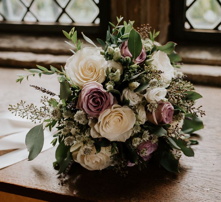 White and Purple Rose Bouquet Tied in Ribbon