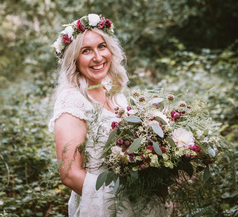 Bride with Oversized Bouquet of Wild Trailing Flowers