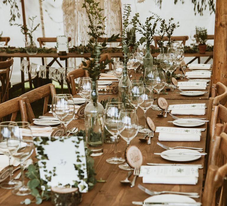 Wooden Banquet Tables with Foliage Centrepieces