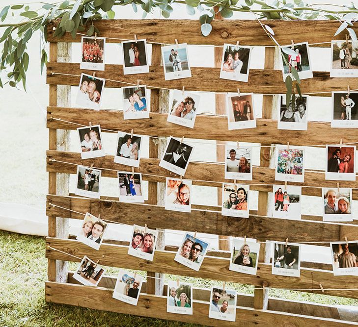 Polaroid Photos on Wooden Pallet