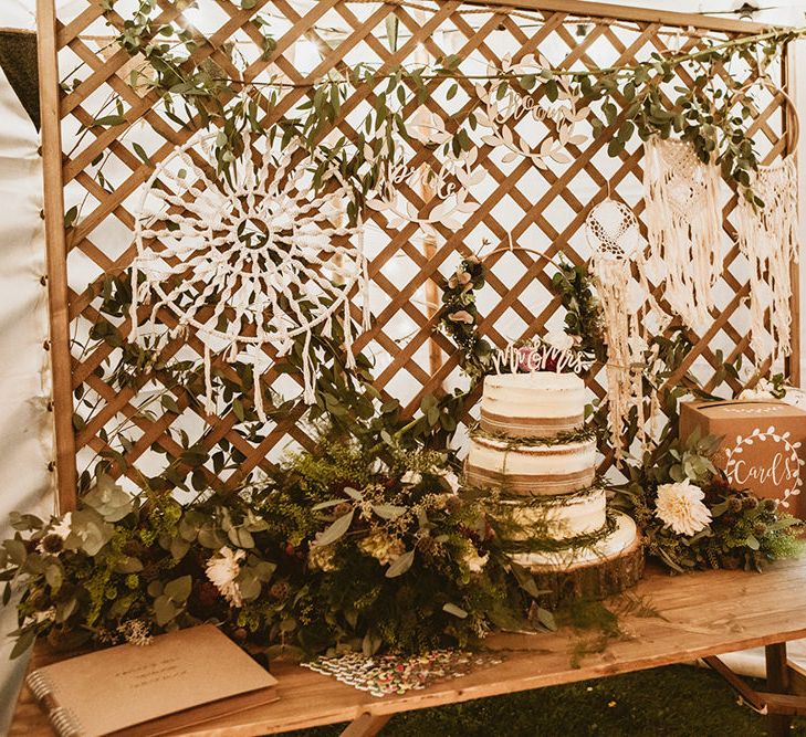 Wooden Table Displaying Cake, Card Box and Guestbook