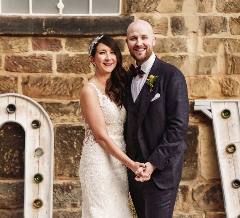 Bride in Lace Martina Liana Wedding Dress &amp; Groom in Tom Ford Suit