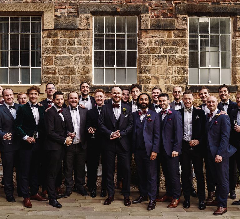 Groom in Tom Ford Suit and Bow Tie and Male Friends in Black Tie Suits