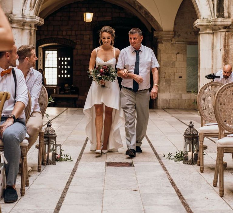 Bride in high low wedding dress for same-sex wedding