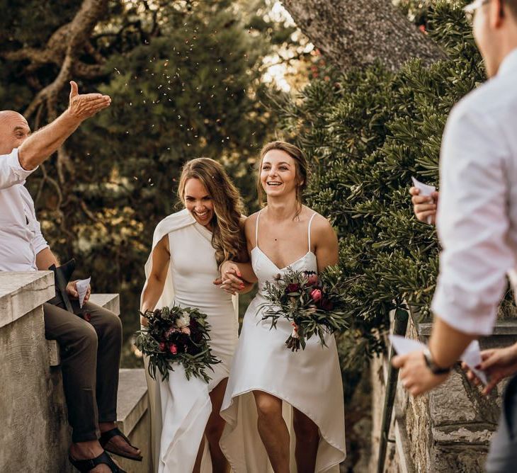 Confetti exit for bride and bride in Croatia