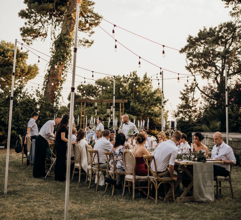 Festoon lighting for outdoor wedding