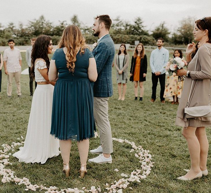 Bride and groom tie the knot at a park overlooking the East River