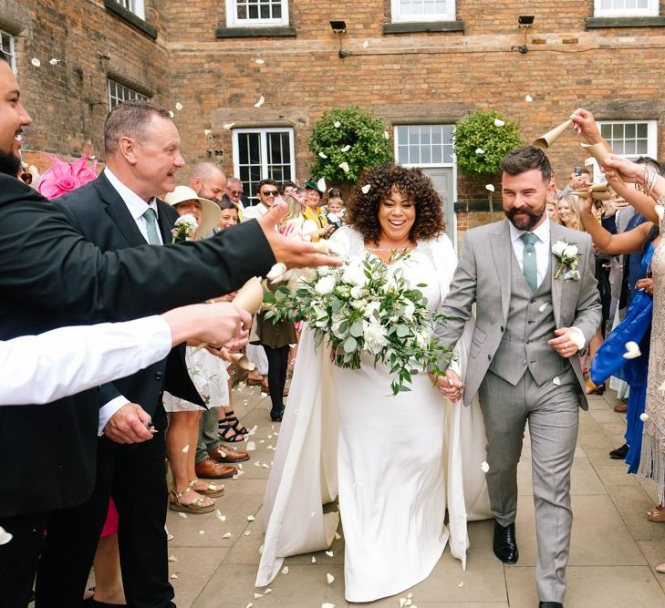 Confetti exit for bride and groom