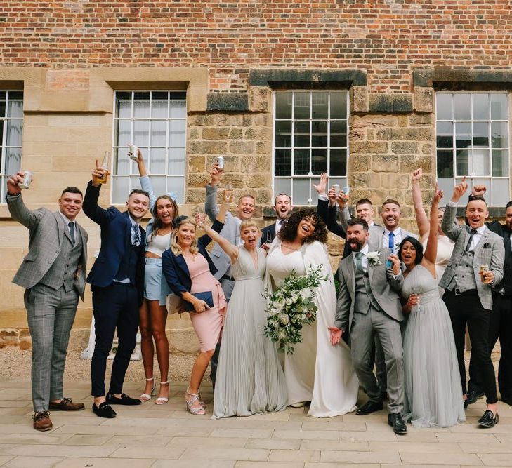 Wedding party in front of industrial wedding venue in Derbyshire