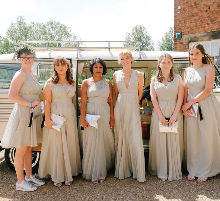 Pastel bridesmaid dress with wedding car