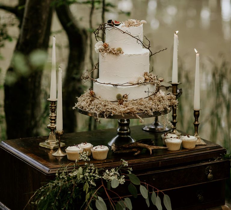 Buttercream Three Tiered Wedding Cake Decorated with Twine and Woodland Flowers