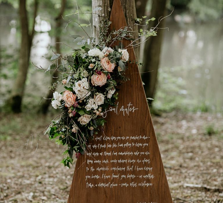 Wooden Triangle Wedding Sign with Quote and Floral Decor