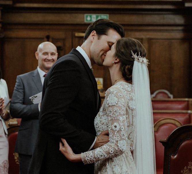 Wedding Ceremony | Bride in Beaded Needle &amp; Thread Wedding Dress with Long Sleeves | Groom in Marks &amp; Spencer Suit with Olive Tie | Britten Veil | Tania Maris Hairpiece | Islington Town Hall | Beaded Needle &amp; Thread Dress for Intimate Islington Wedding | Olivia &amp; Dan Photography