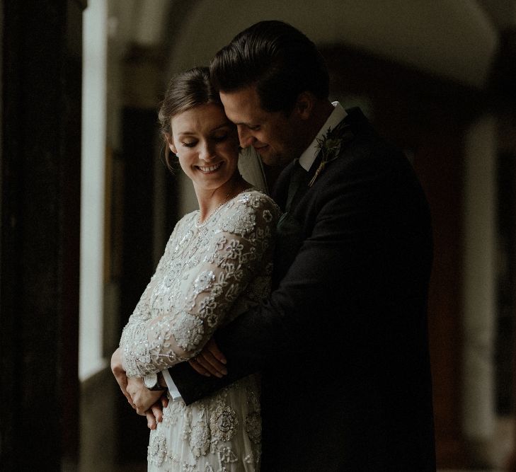 Bride in Beaded Needle &amp; Thread Wedding Dress with Long Sleeves | Groom in Marks &amp; Spencer Suit with Olive Tie | Britten Veil | Beaded Needle &amp; Thread Dress for Intimate Islington Wedding | Olivia &amp; Dan Photography