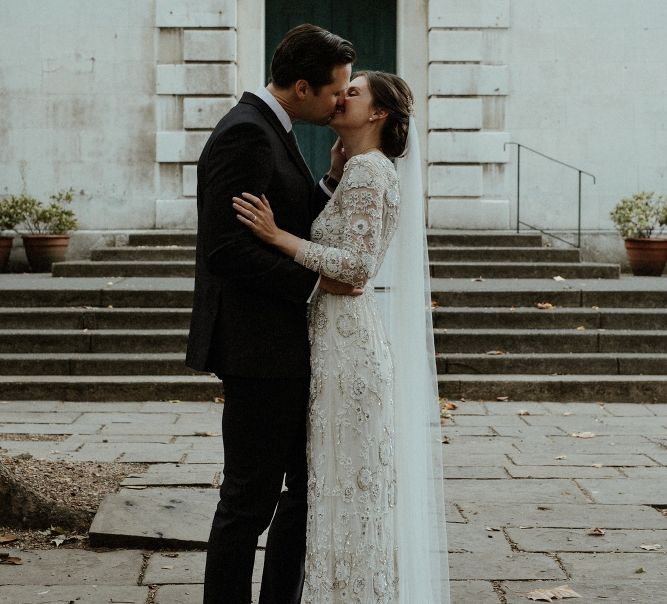 Bride in Beaded Needle &amp; Thread Wedding Dress with Long Sleeves | Groom in Marks &amp; Spencer Suit with Olive Tie | Britten Veil | Beaded Needle &amp; Thread Dress for Intimate Islington Wedding | Olivia &amp; Dan Photography