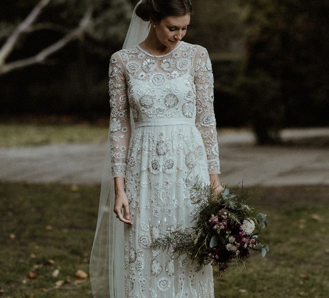 Bride in Beaded Needle &amp; Thread Wedding Dress with Long Sleeves | Britten Veil | Maroon and White Bridal Bouquet with Green Foliage | Beaded Needle &amp; Thread Dress for Intimate Islington Wedding | Olivia &amp; Dan Photography