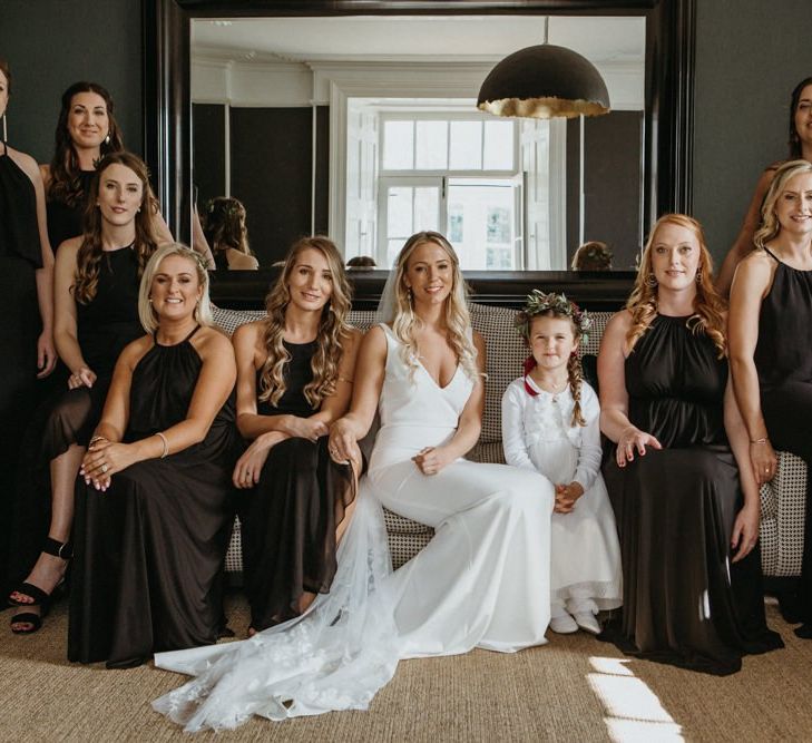 Bridal party in black bridesmaid dresses