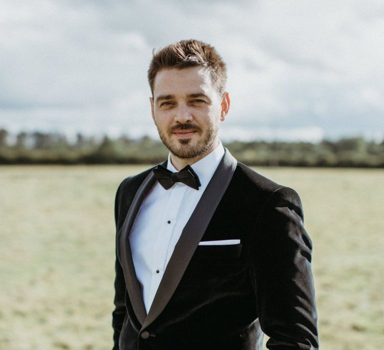 Groom in velvet tuxedo