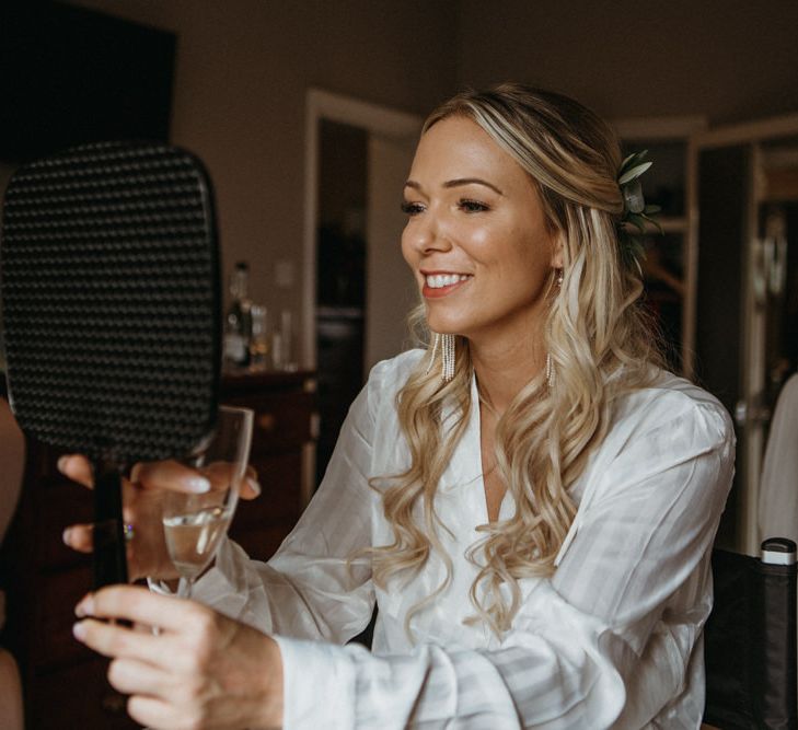 Bridal preparations at Norfolk wedding with supermarket wedding cake