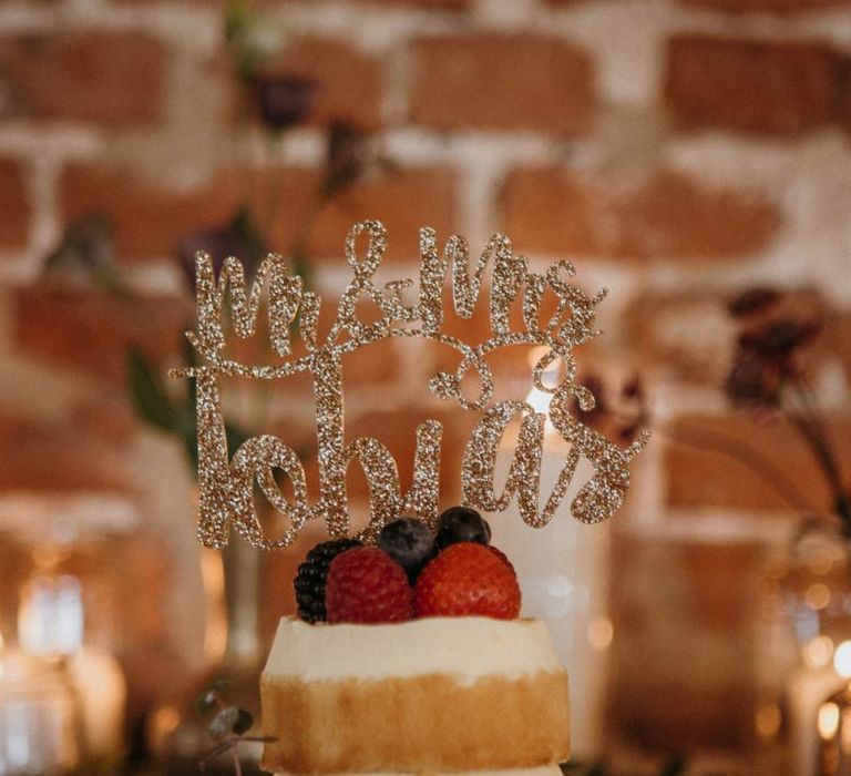 Personalised cake topper on supermarket wedding cake