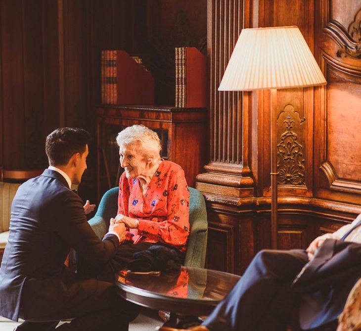 Groom with relative at London wedding