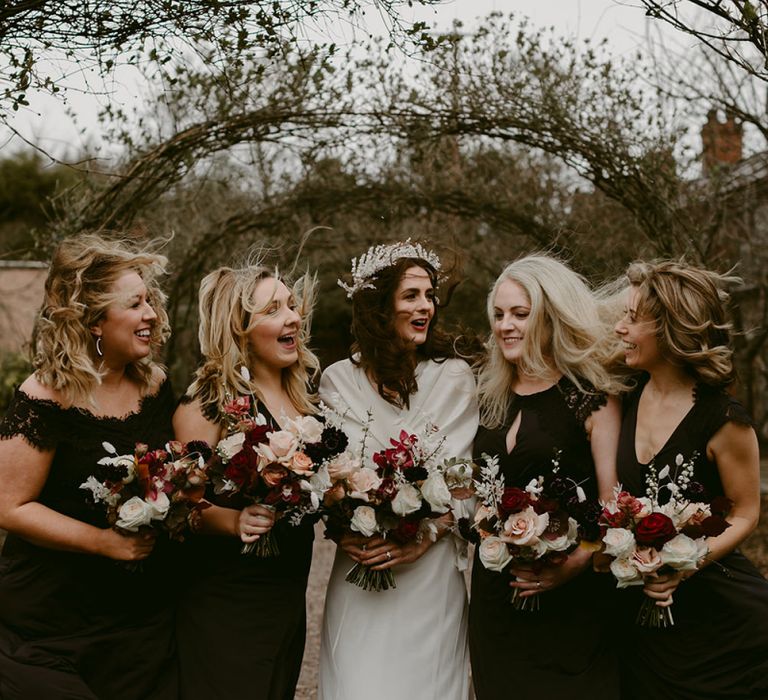 Bridal Party with Bridesmaids in Black Monsoon Dresses and Bride in Halfpenny London Juniper Dress &amp; Lilly Skirt and Luna Bea Headdress