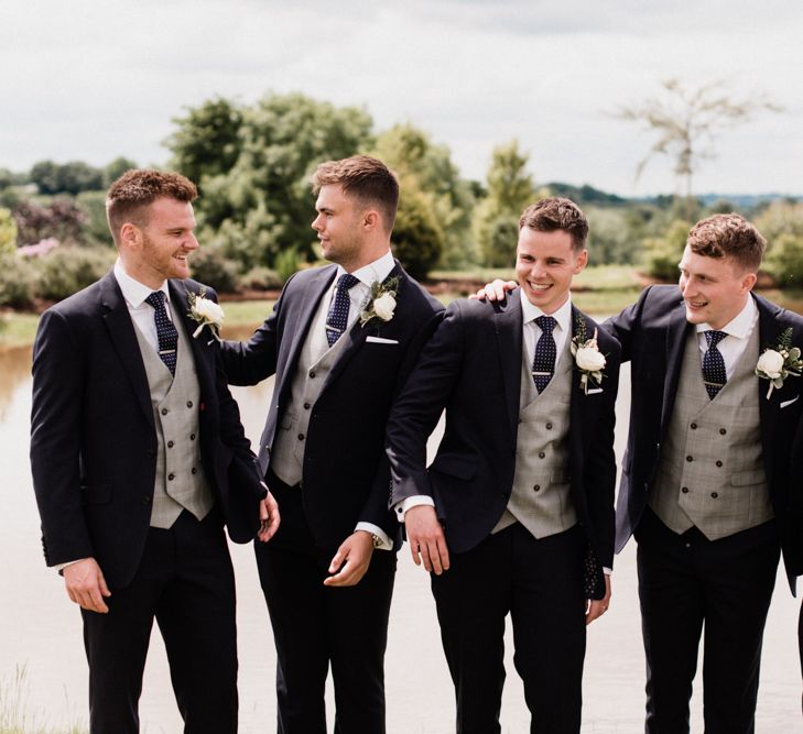 Groomsmen in Navy Suits and Grey Waistcoats