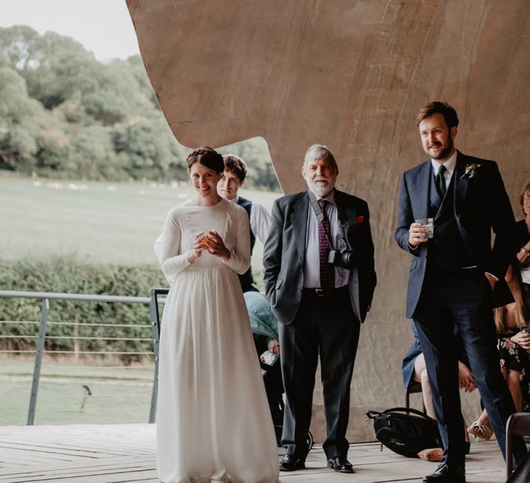 Bride in Homemade Wedding Dress with Long Sleeves in Pod